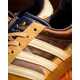 Collaborative Textual Patchwork Sneakers Image 1